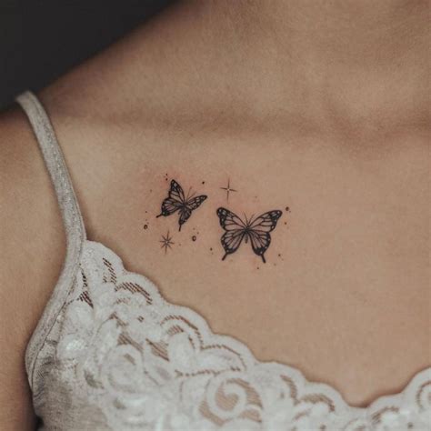 collar bone small butterfly tattoo on chest|60 Small Butterfly Tattoo Ideas